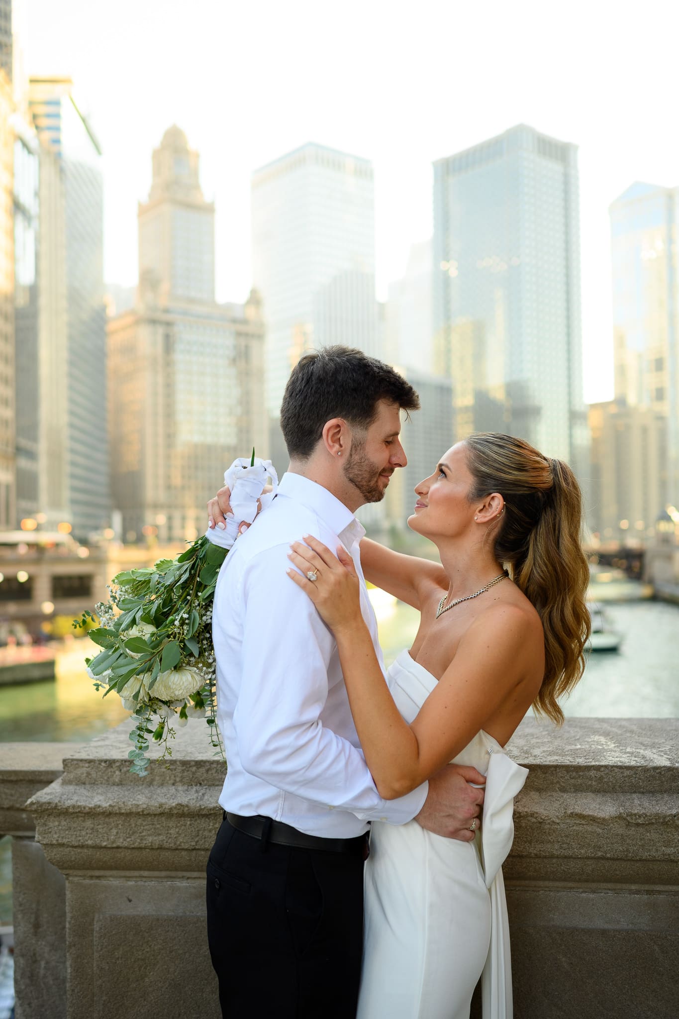 Hayley and Dan during their elopement portraits in downtown Chicago with iconic city architecture