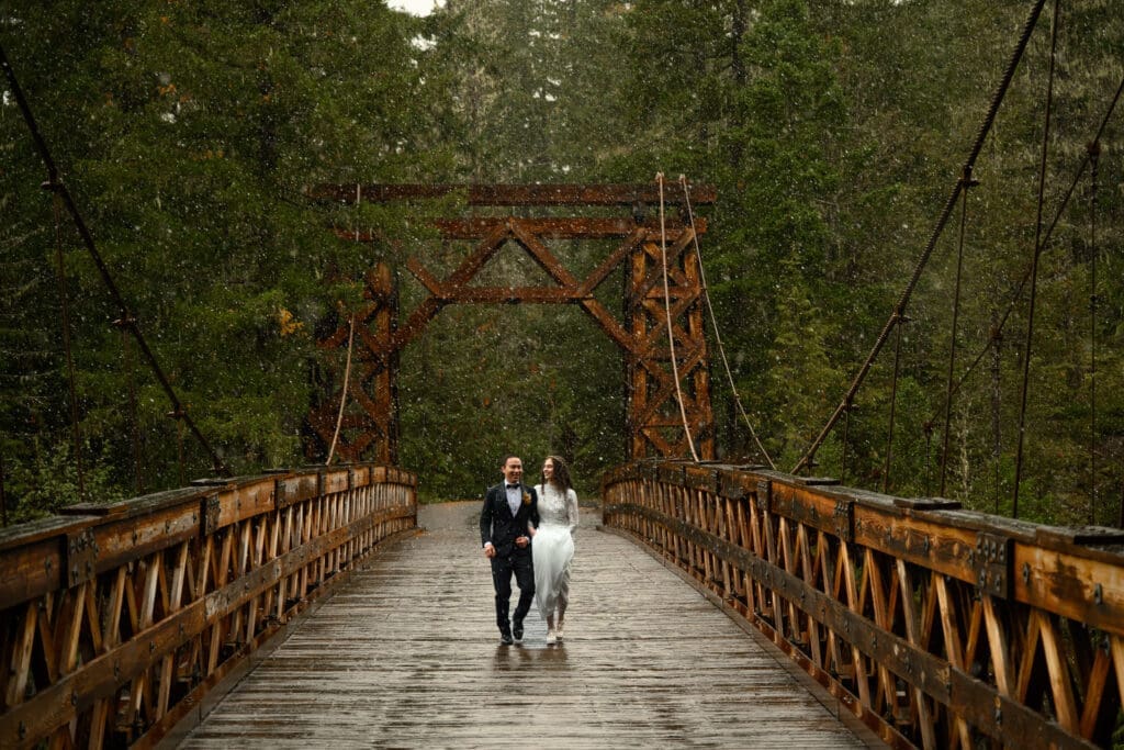 Fall Mt. Rainier elopement photos with colorful trees and snowflakes at Longmire.